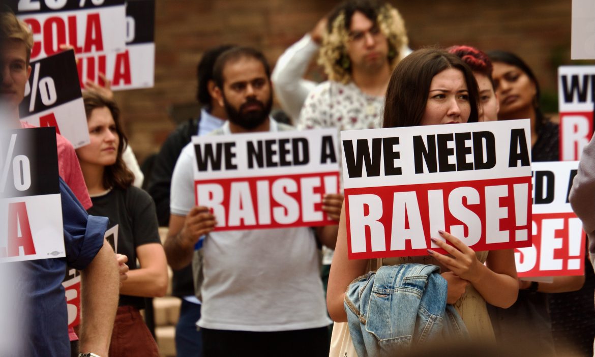 Labor protesters with signs
